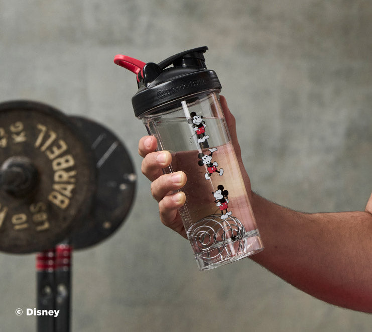 pro-series-z7 Mickey_Mouse_Protein_Shaker_Bottle_Being_Held_In_the_Gym.jpg